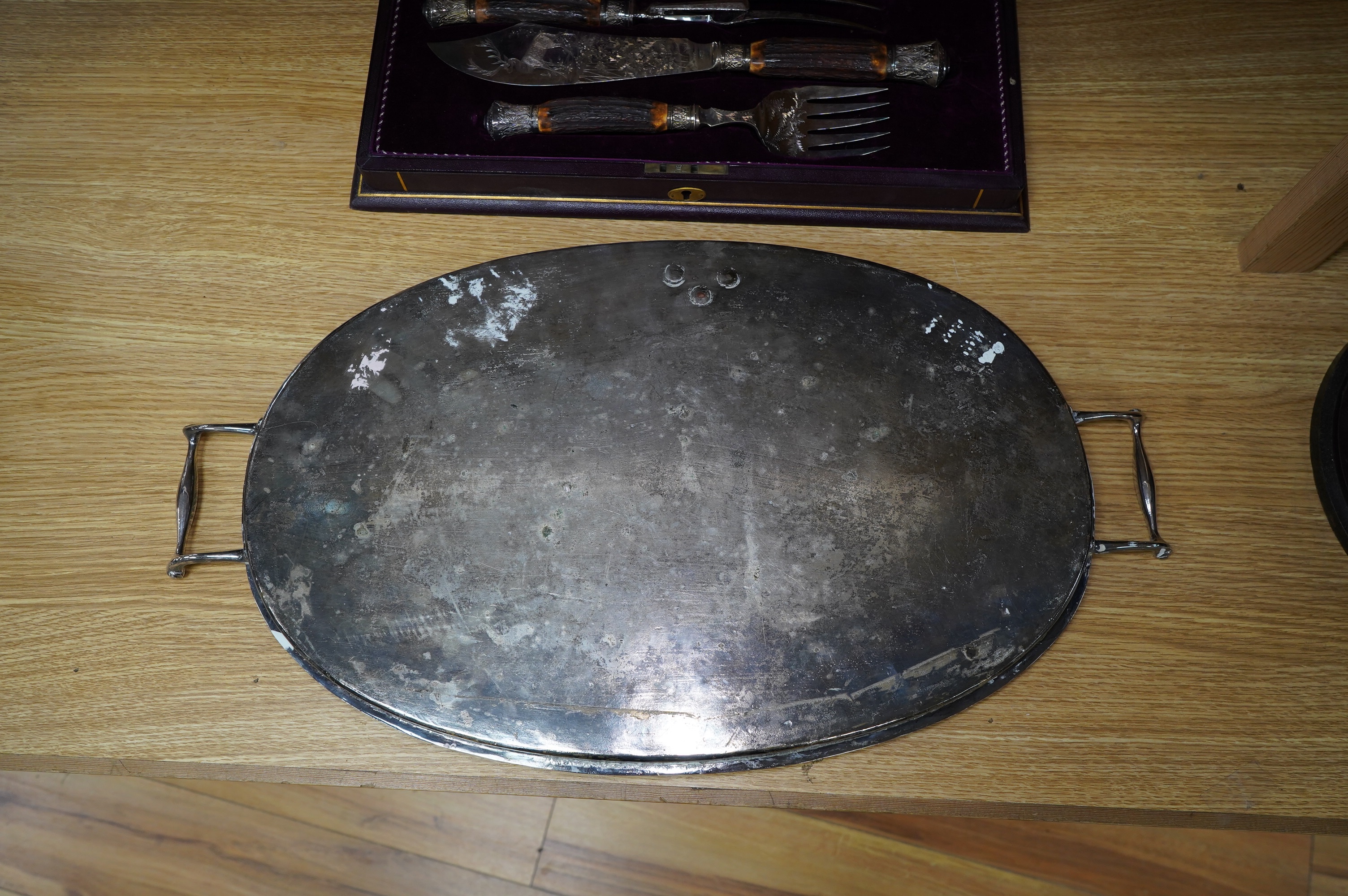 An Edwardian plated oval tray, 58.5cm. Condition - fair